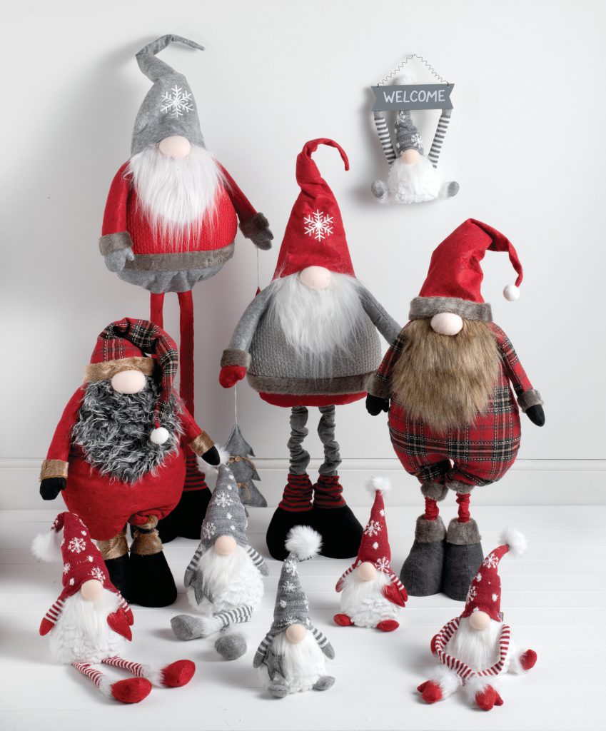 A selection of Gonks both standing and sitting in red and grey colours