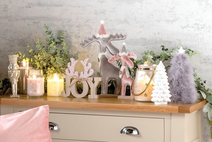 Sideboard decorated with pink and grey decorations