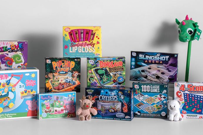 A selection of board games and toys on a white background