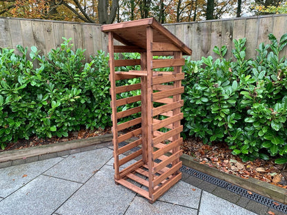 Scandinavian Redwood Garden Log Store by Charles Taylor