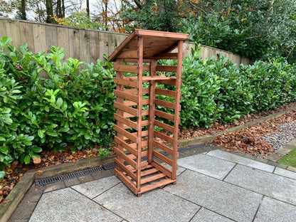 Scandinavian Redwood Garden Log Store by Charles Taylor