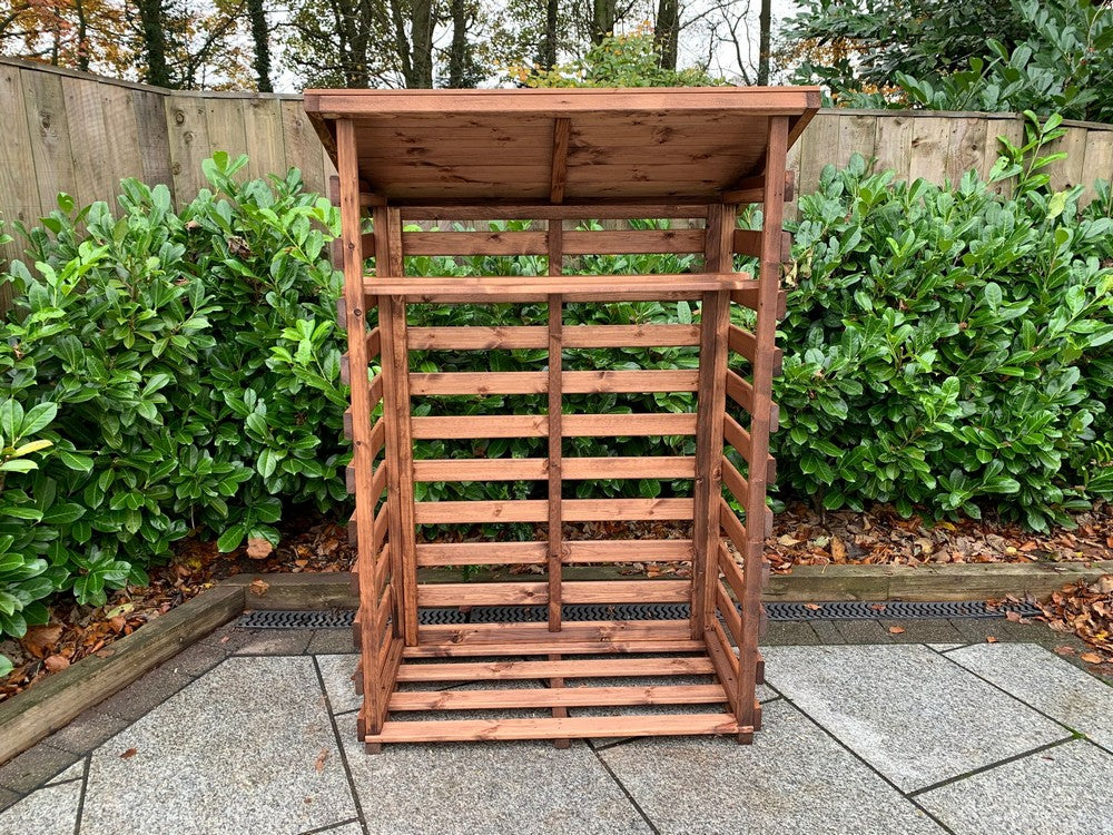 Scandinavian Redwood Garden Log Store by Charles Taylor
