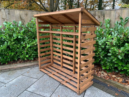 Scandinavian Redwood Garden Log Store by Charles Taylor