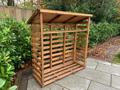 Scandinavian Redwood Garden Log Store by Charles Taylor