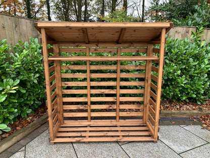 Scandinavian Redwood Garden Log Store by Charles Taylor
