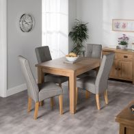See more information about the Cotswold Oak Dining Table Set With 4 Grey Milan Chairs